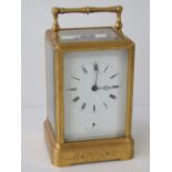 A five glass brass cased carriage clock, enamelled dial with Roman numerals and blued steel hands,