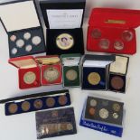 A Pobjoy Mint Ltd crown collection together with a QEII Diamond Jubilee 65mm coin,