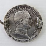 A silver Italian 2 Lira Vittorio Emanuele III coin within brooch frame.