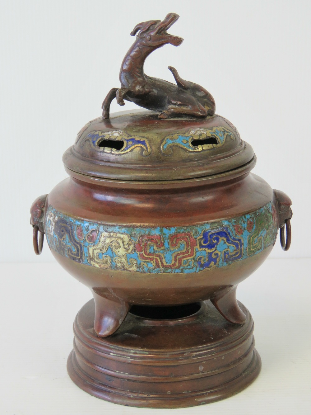 A fine bronze Oriental lidded censer having a band of cloisonné decoration and raised over three - Image 3 of 4