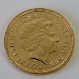 A mint and uncirculated 22ct gold 2015 Elizabeth II full sovereign, 8g.