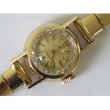 An 18ct gold Cyma ladies cocktail watch having integral 18ct gold articulated strap,