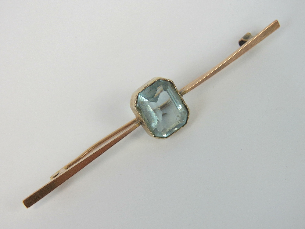 A 9ct gold and aquamarine brooch,