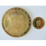 A 9ct gold 1g 1953 Coronation Half Crown coin 'The Royal House of Windsor' collection,