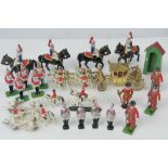 A collection of Britains and other lead soldiers and figures including the royal coronation state