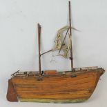 A hand built model pond sailing ship,