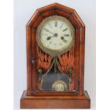 A mahogany case table clock, painted dial with Roman numerals all before the eight day movement.