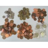 A quantity of assorted 20th century coinage including threepenny bits, four commemorate £2 pieces,
