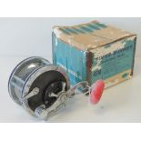 A Penn 49M multiplier sea reel with original box.