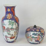 An early 20th century Japanese scenic vase, together with a matching ginger jar having fitted lid.