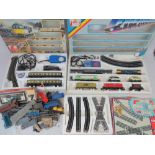 Two Lima Models 00 gauge railway sets and additional track, all with original boxes, etc.