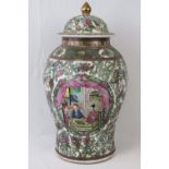 A large late 19th century Oriental Famille Rose ginger jar with lid, profusely decorated throughout,