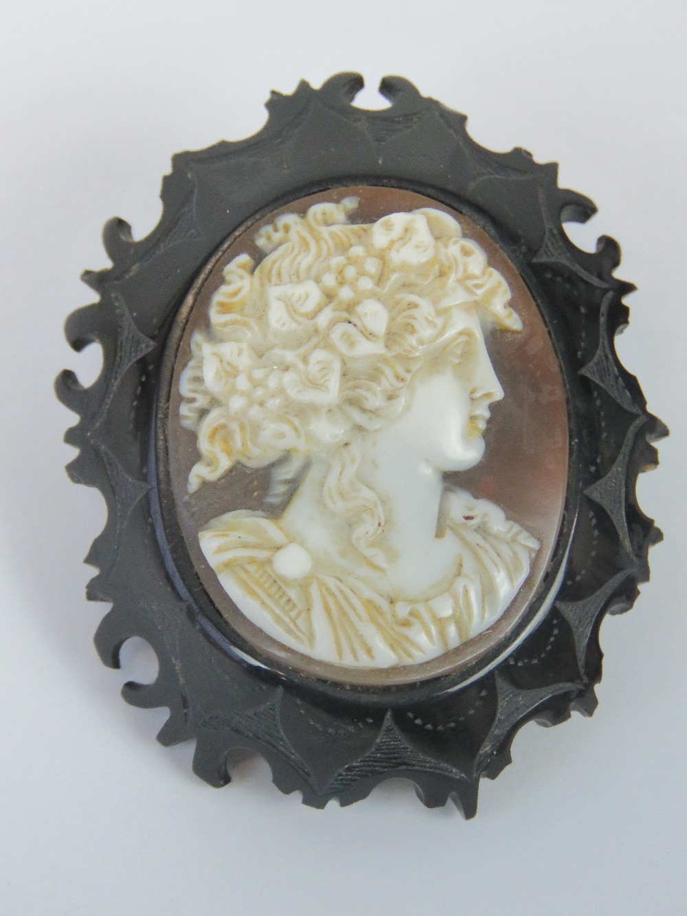 A delightful Victorian Whitby jet cameo brooch,