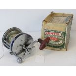 A Pflueger Capitol multiplier sea reel with original box.