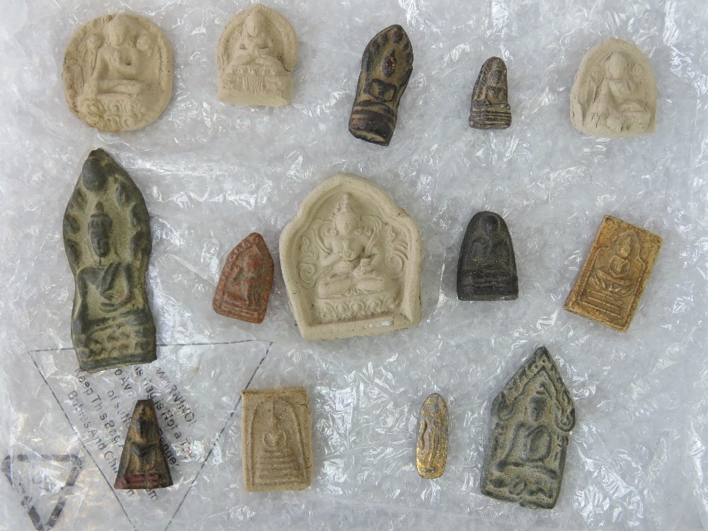 A quantity of Tibetan Buddhist tsa-tsas halidom votive tablet prayer or meditation figures,