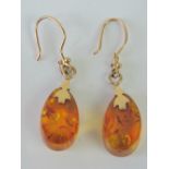 A pair of 14ct gold Russian amber earrings, having 583 Soviet hallmark upon.