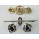 A HM silver brooch of open bar and floral design, together with a silver bar brooch,