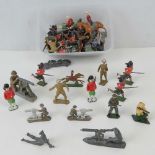 A collection of vintage lead model soldiers including some by Britains Ltd,