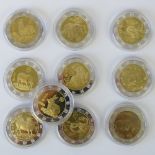 A quantity of silver and gold plated Chinese zodiacal coins, 12 in number each weighing 25.3g.