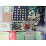 A quantity of royal mint collectors coin sets including the Philippines, the Seychelles, Jordan,