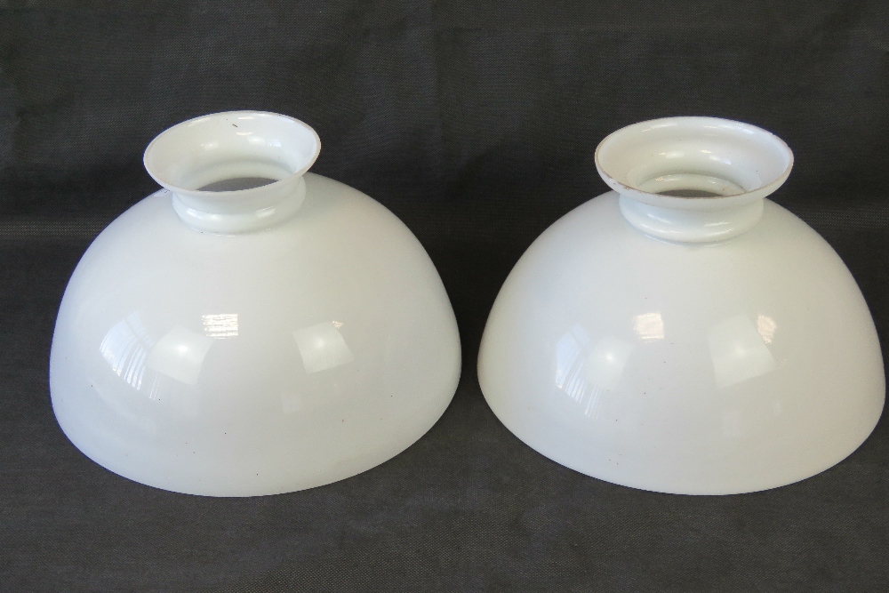 Two similar large white opaque glass lig