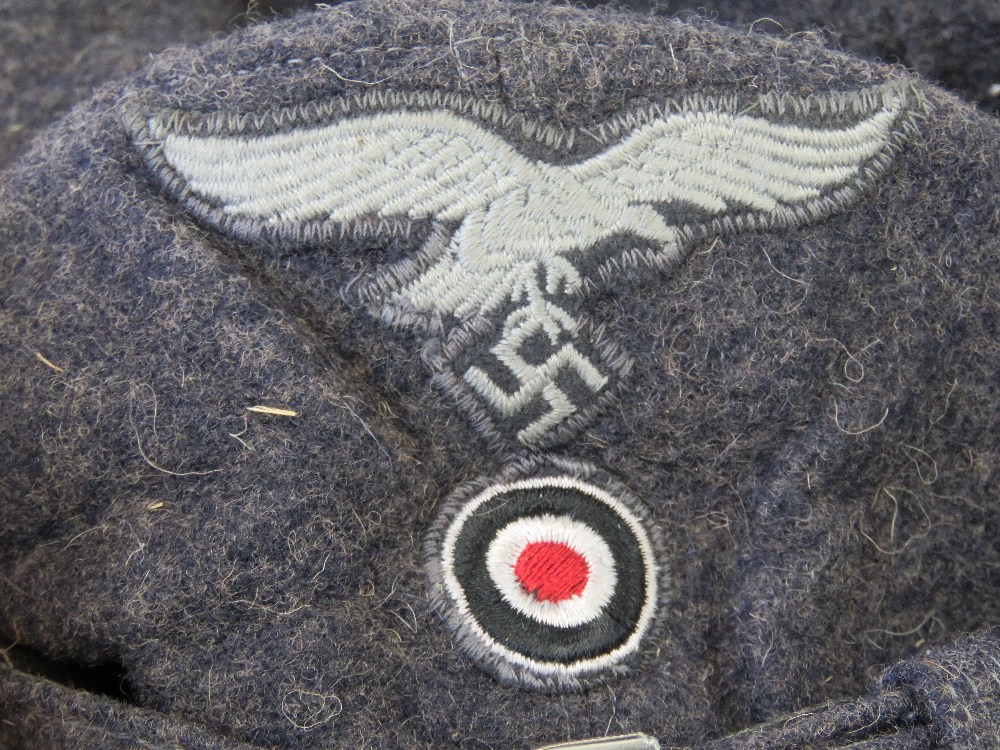 A WWII German Hitler Youth Luftwaffe Regiment ski cap with cloth eagle and badge. - Image 4 of 4