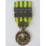 A French Indo-China (Dien Bien Phu) medal c1954 with ribbon, non-sate issued private manufacture.