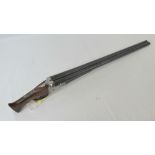 A deactivated (EU Spec) Belgian double barrel 12 Gauge Boxlock Shotgun having 25” barrels with cut