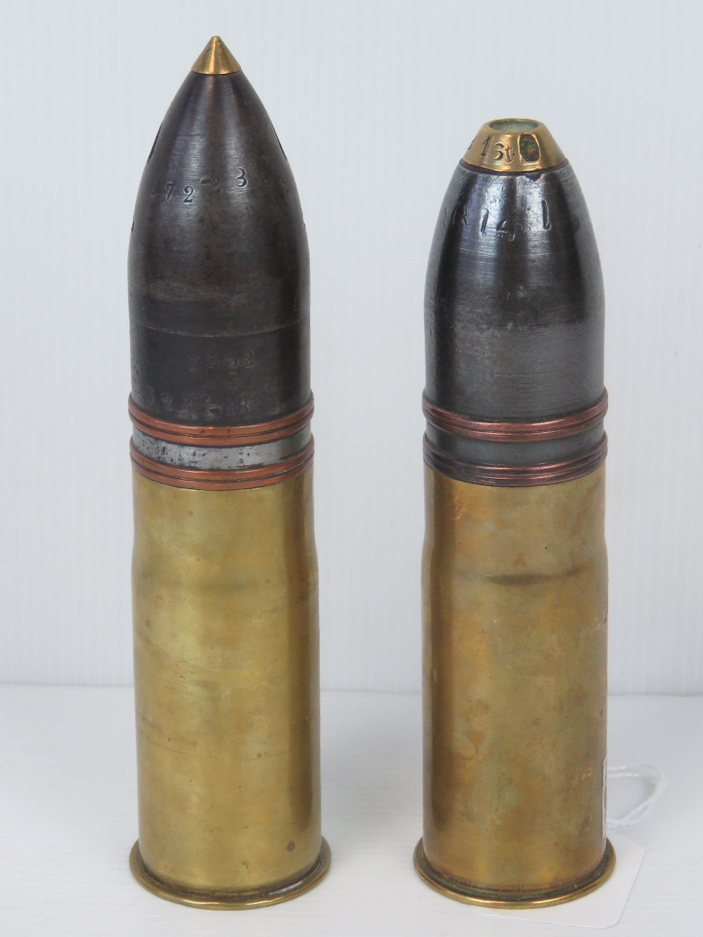 Two inert WWI French 37mm Pom Pom cannon rounds,