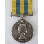 A Korea medal marked for 21124429 SPR J.C.M Cartlidge R.E., with ribbon.