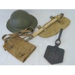 A WWII British helmet, Bren pouch and entrenching tool.