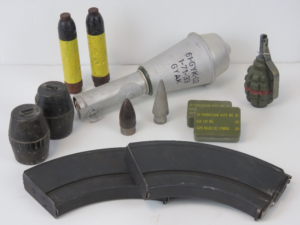 Six inert grenades, together with two inert grenade heads, two WWII Home Guard tins,