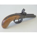 An antique double barrelled .44 calibre percussion pistol with octagonal barrels.