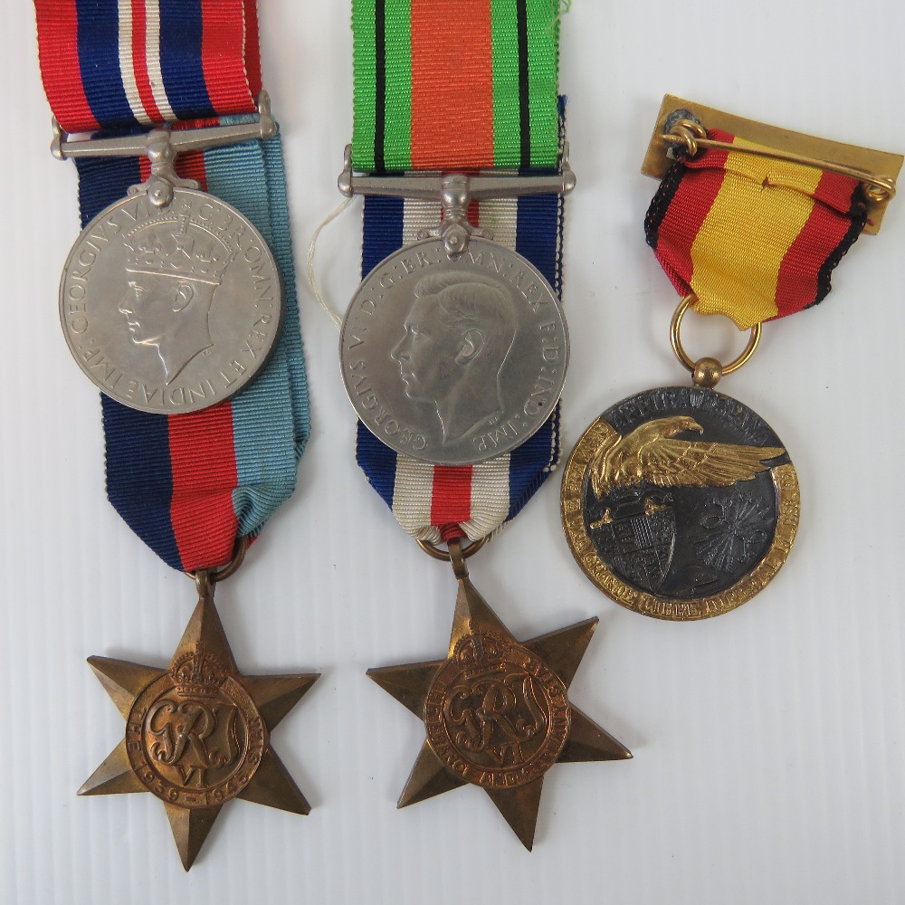 A WWII British medal group comprising War medal, Defence medal, 1939-45 Star, - Image 2 of 2