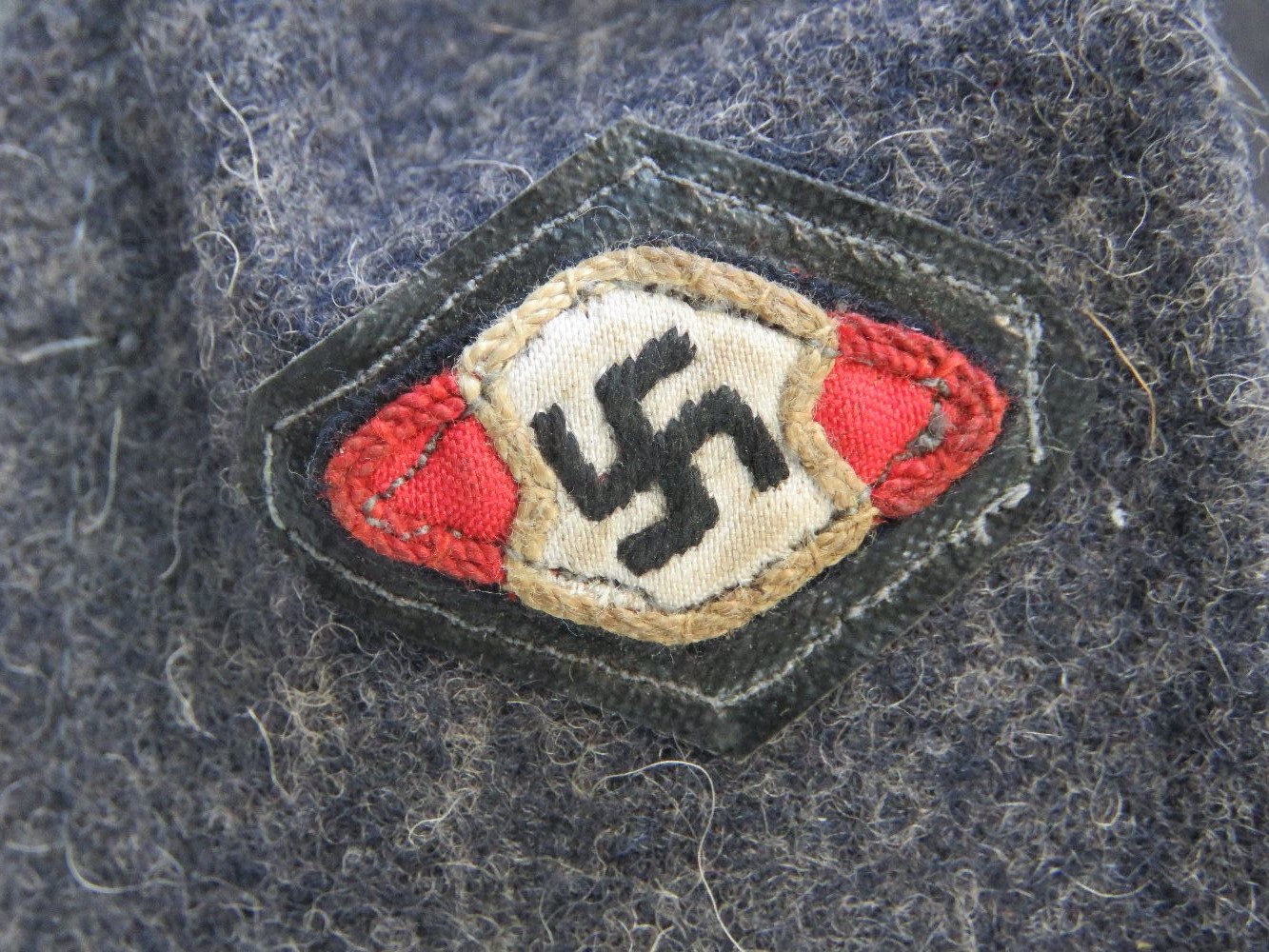 A WWII German Hitler Youth Luftwaffe Regiment ski cap with cloth eagle and badge. - Image 3 of 4