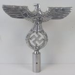 A large cast aluminium eagle and swastika wreath flagpole finial for political leaders, 25cm high.