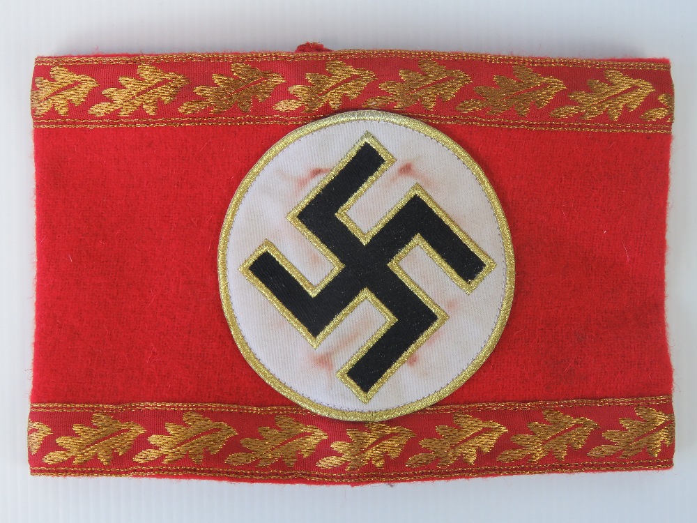 A WWII German Political Leaders ceremonial armband with gilt braid.