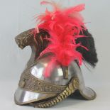 A 19th century French cavalry helmet with elaborate detailing,