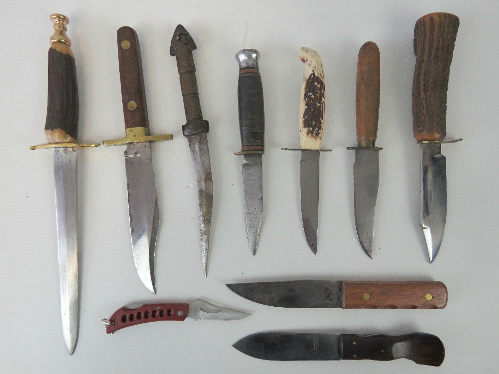 Seven daggers with scabbards, together with a pen knife and two other knives without scabbards. - Image 2 of 2