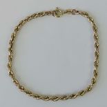 A 9ct gold rope chain bracelet, hallmarked 375, 20cm in length, 2.5g.