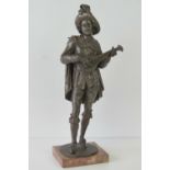 A late 19th century speltre figure of a minstrel with lute in standing pose upon a rouge marble