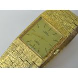 A C1970s Swiss Emperor 17 jewel Incabloc gold plated watch having heavy bark-effect articulated