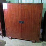 An impressive Ralph Lauren two door drawing room cabinet, doors opening to reveal drawers,