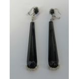 A pair of 18ct gold diamond and onyx earrings,