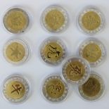 A quantity of silver and gold plated Chinese zodiacal coins, each weighing 25.3g.