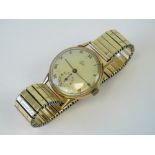A vintage 18ct gold Ebel wristwatch on gold plated expanding strap,