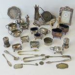 A quantity of assorted silver plated items including; Whisky decanter label, salts, pepperettes,