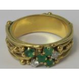 An emerald and diamond ring,