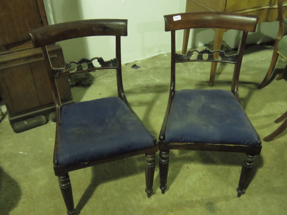 A pair of 19th century mahogany bar back dinning chairs, both with cane seats now upholstered over.