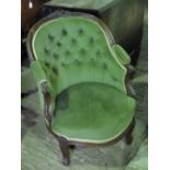 A late Victorian mahogany framed tub drawing room chair.
